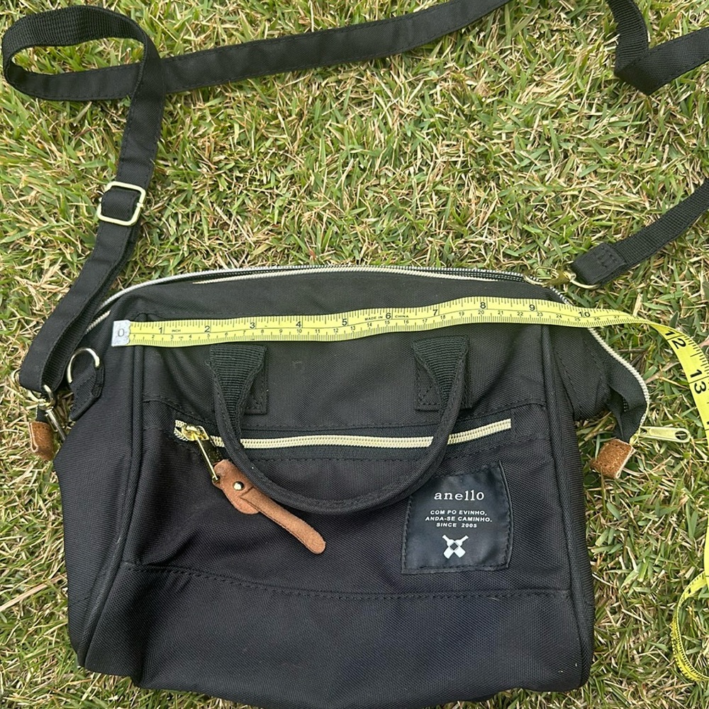 Anello shoulder bag black with gold zippers for sale